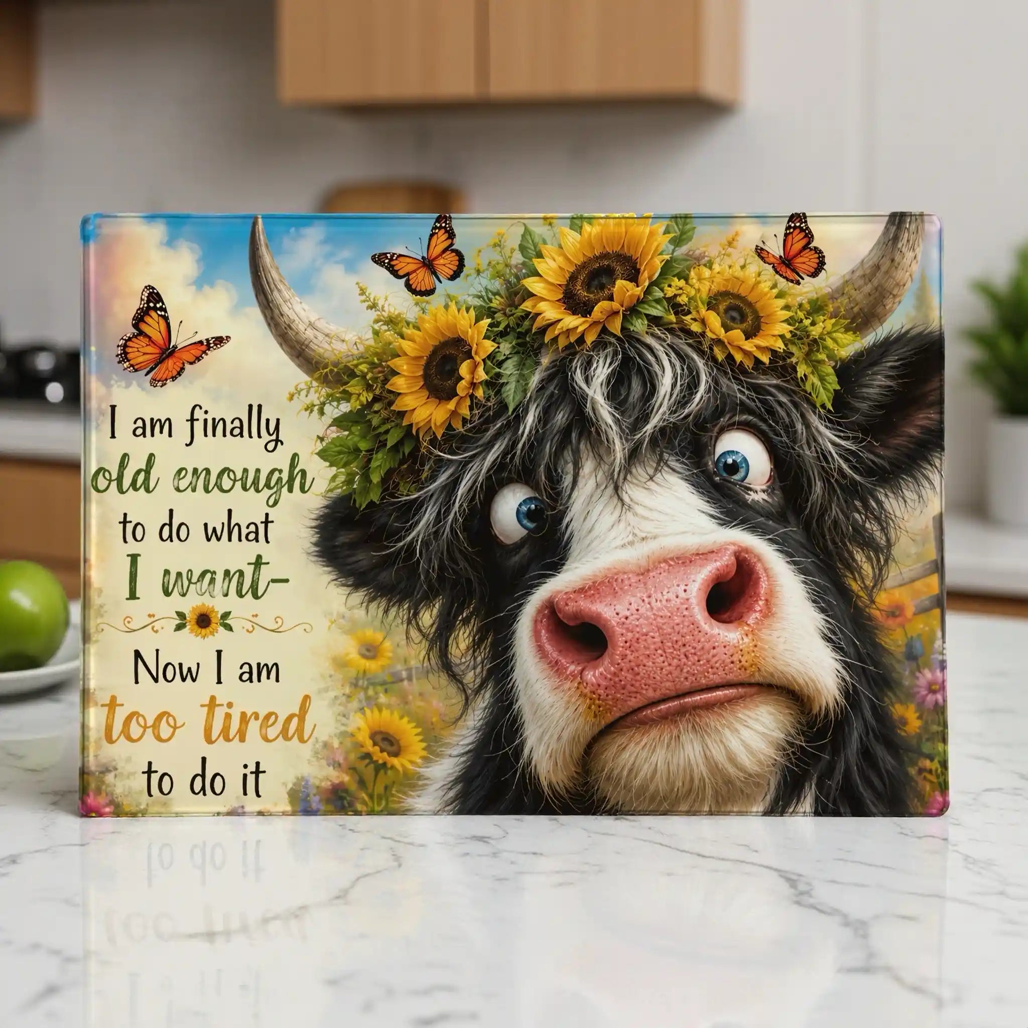 Humorous illustration of a tired highland cow with a funny quote about aging chopping board from Laser Design Creations