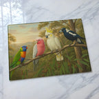 Vibrant Australian native birds glass chopping board from Laser Design Creations featuring a colourful galah, rainbow lorikeet, white cockatoo & a magpie.