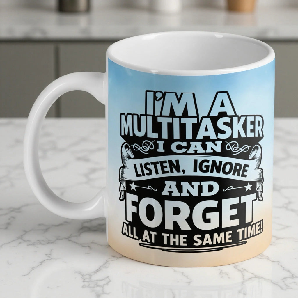 Funny Multitasker ceramic mug by Laser Design Creations, featuring bold typographic quote about listening, ignoring, and forgetting.