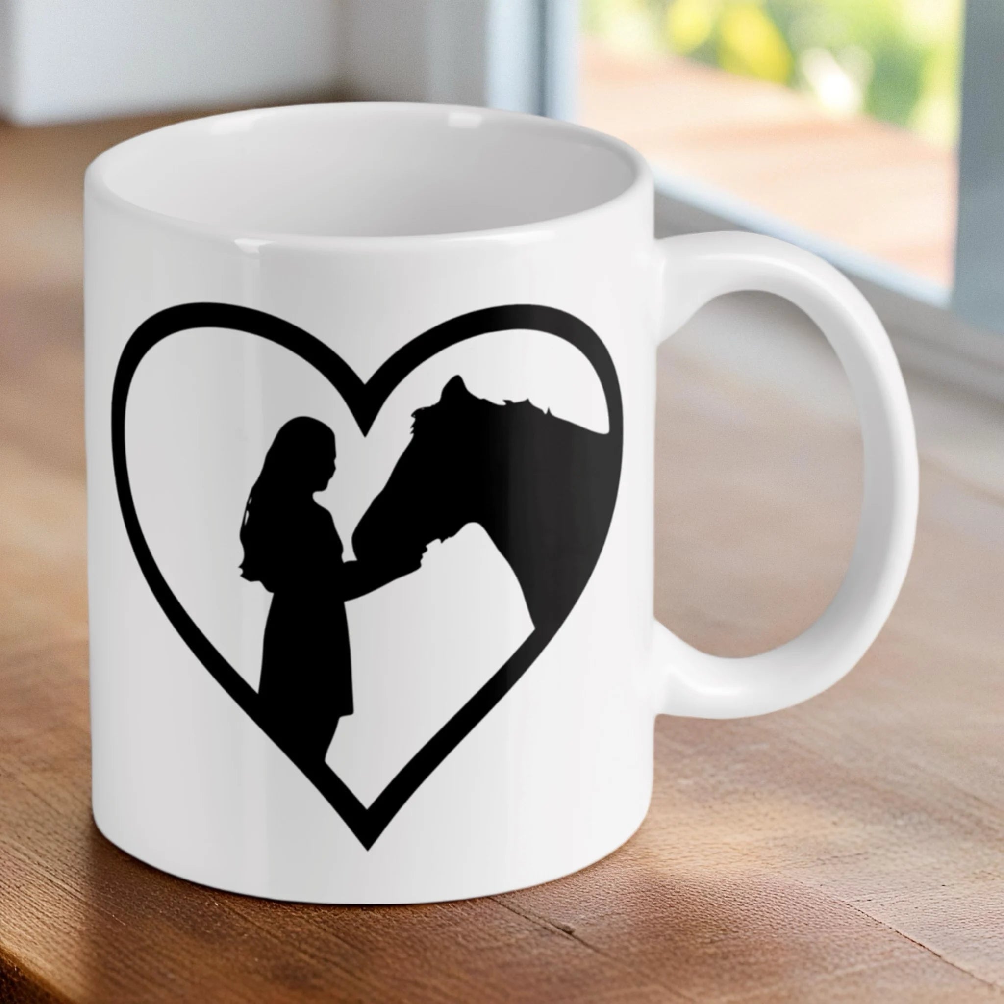 Reverse side of girl and horse heart silhouette ceramic mug, showcasing the wrap-around artwork by Laser Design Creations.