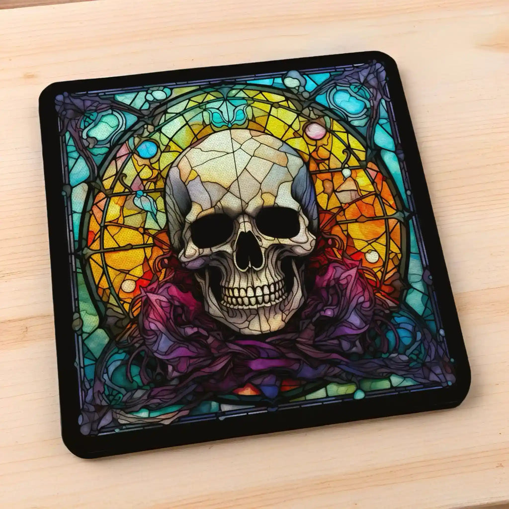 Side view of Gothic Stained Glass Skull style 2 neoprene coasters, showcasing distinct skull mosaic designs in vibrant dark fantasy colours with intricate leaded glass details by Laser Design Creations.