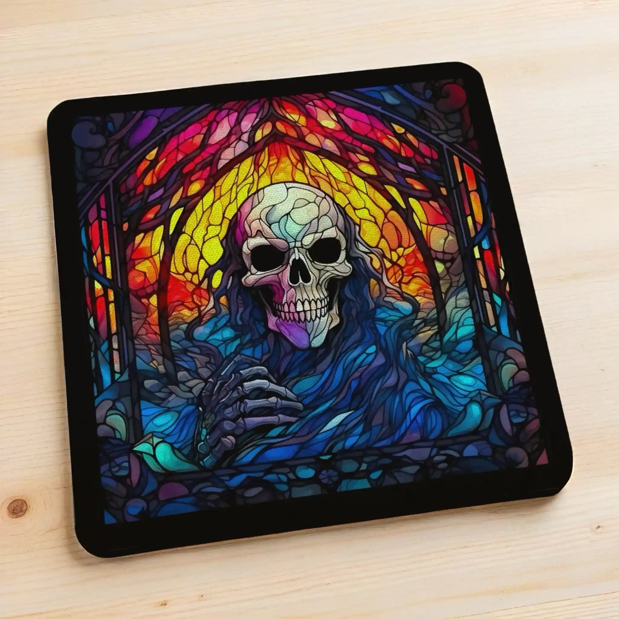 Side view of Gothic Stained Glass Skull style 3 neoprene coasters, showcasing distinct skull mosaic designs in vibrant dark fantasy colours with intricate leaded glass details by Laser Design Creations.