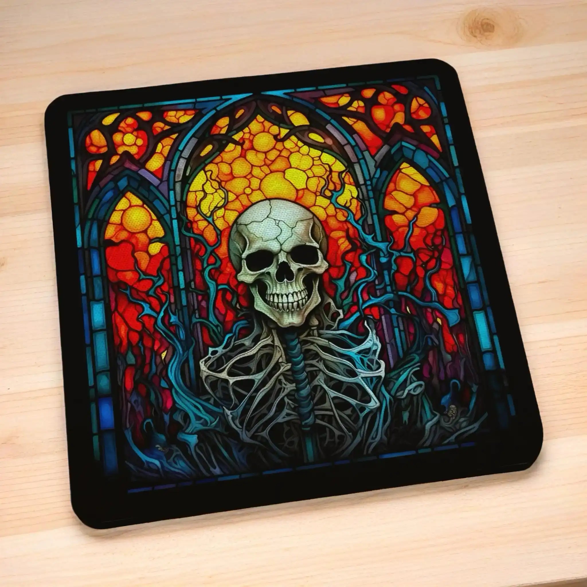 Side view of Gothic Stained Glass Skull style 4 neoprene coasters, showcasing distinct skull mosaic designs in vibrant dark fantasy colours with intricate leaded glass details by Laser Design Creations.