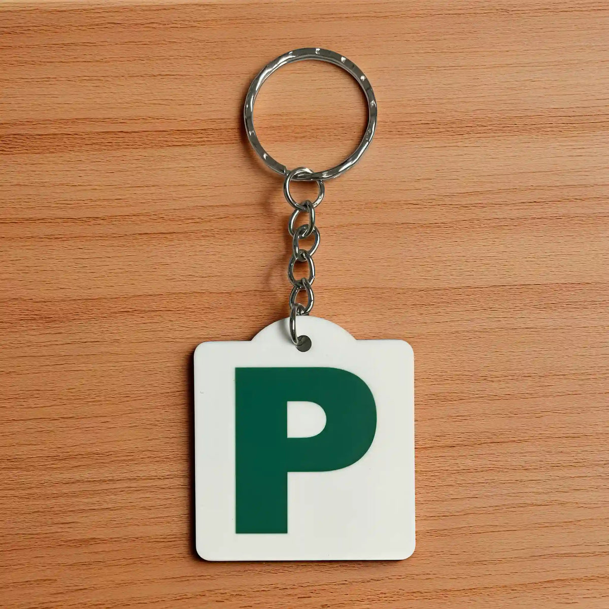 Front view of Personalised Green P Provisional Plate acrylic keyring, showcasing an iconic Australian driving plate design against a soft neutral background by Laser Design Creations.