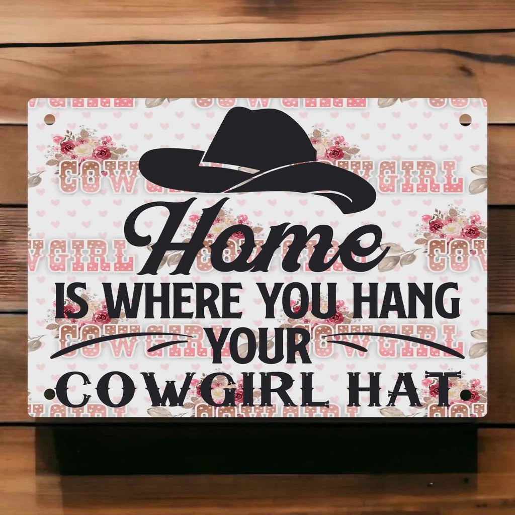 "Home is where you hang your cowgirl hat" Aluminium Sign by Laser Design Creations, featuring a feminine western design with floral accents.