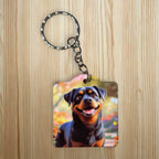 Happy Smiling Rottie Autumn Garden keyring by Laser Design Creations, featuring a realistic, vibrant illustration of a happy Rottie among autumn leaves.