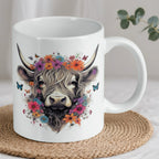 Reverse side of Floral Highland Cow mug, showcasing the colourful watercolour floral cow and butterfly artwork by Laser Design Creations.