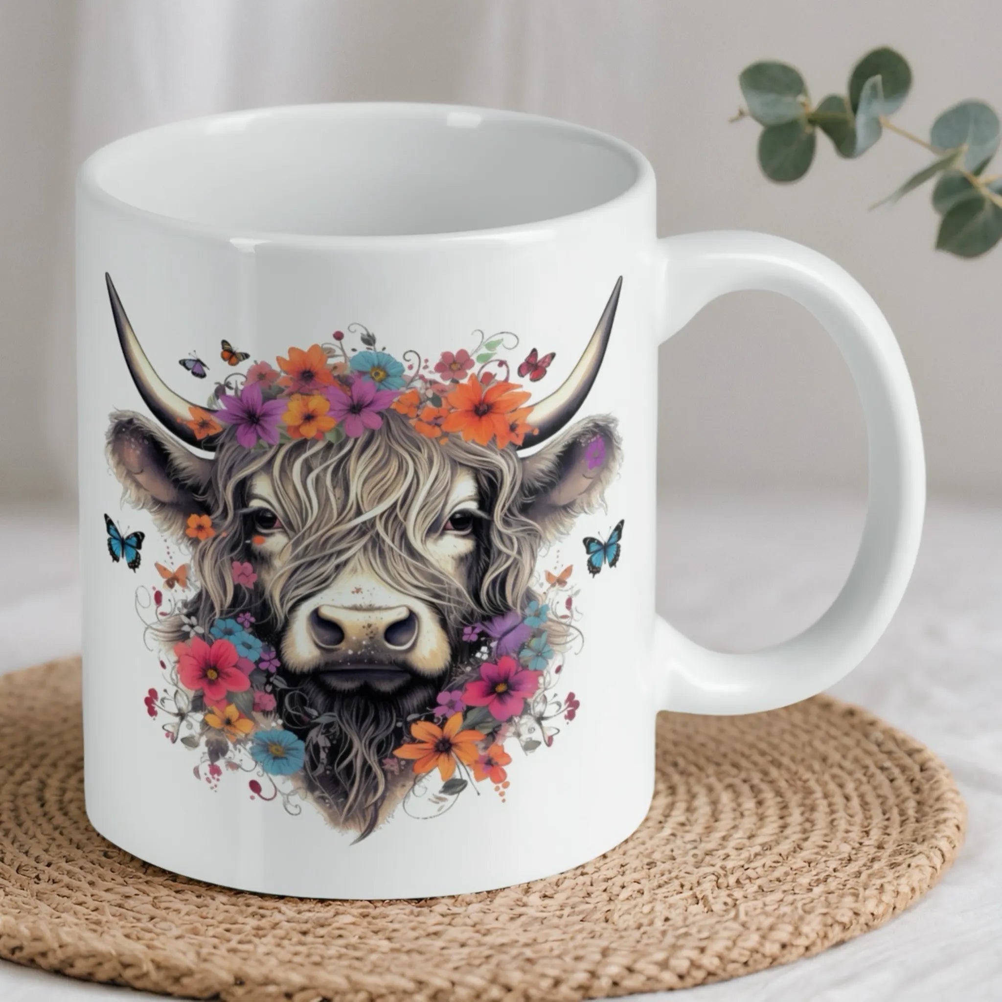 Reverse side of Floral Highland Cow mug, showcasing the colourful watercolour floral cow and butterfly artwork by Laser Design Creations.