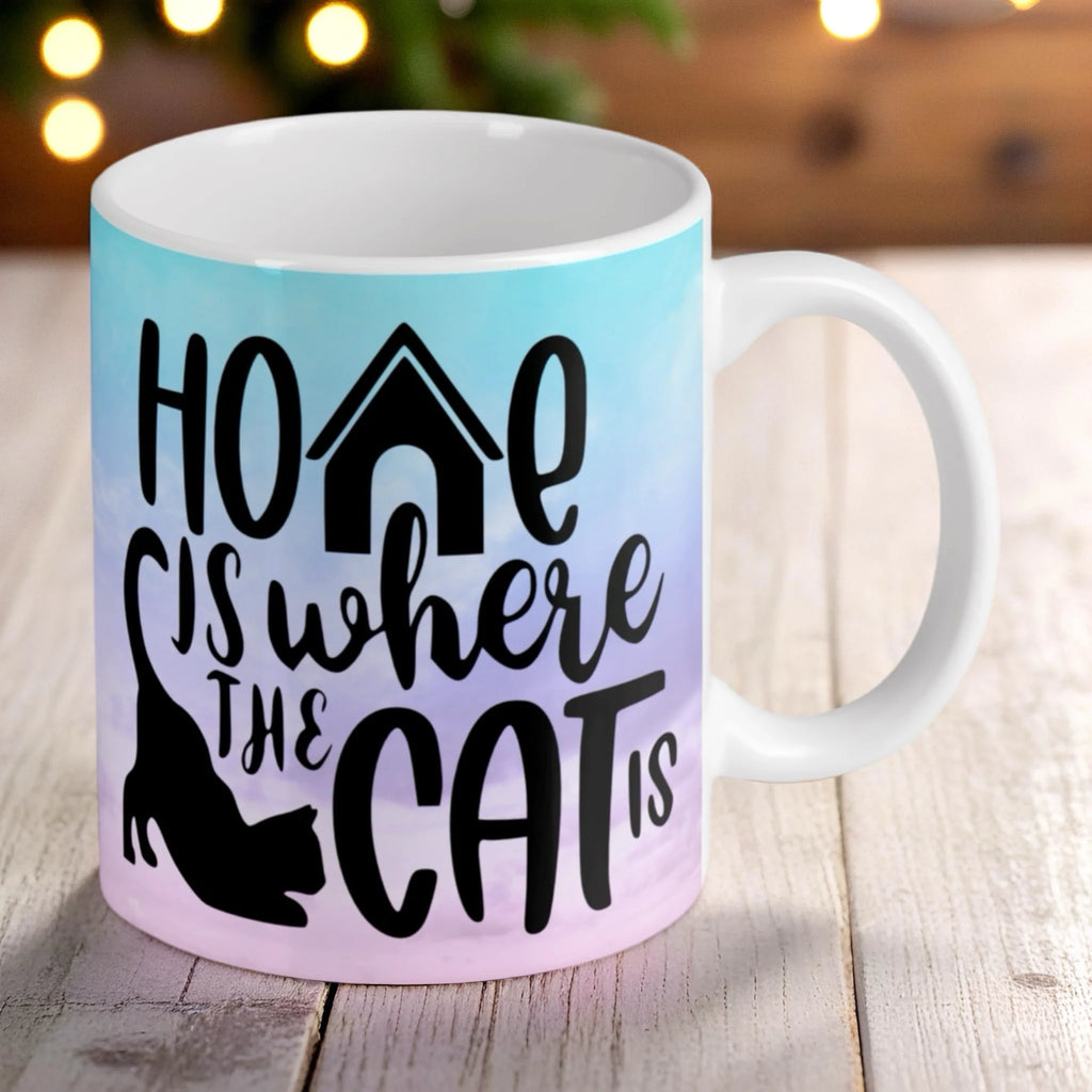 Reverse side of Home Is Where The Cat Is ceramic mug, showcasing the wrap-around artwork.