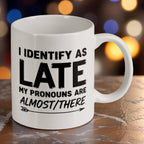 Reverse side of "I Identify As Late" ceramic mug, showcasing the witty quote "I Identify As Late My Pronouns Are Almost/There" by Laser Design Creations.