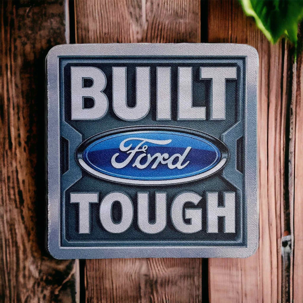 Built Ford Tough Emblem Logo neoprene coasters by Laser Design Creations, featuring the iconic 'BUILT Ford TOUGH' quote in a bold, industrial style.
