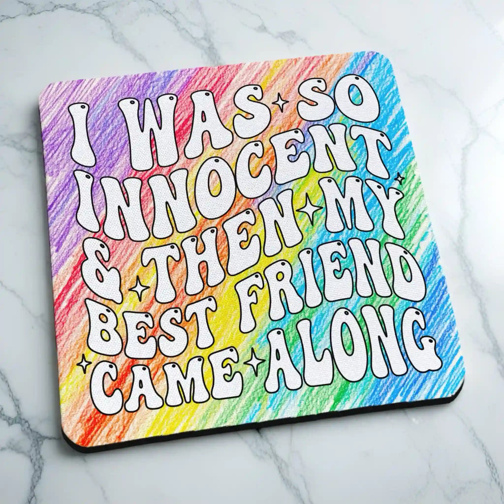 Side view of I Was So Innocent neoprene coaster with retro colourful rainbow quote design, by Laser Design Creations.