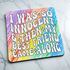 Side view of I Was So Innocent neoprene coaster with retro colourful rainbow quote design, by Laser Design Creations.