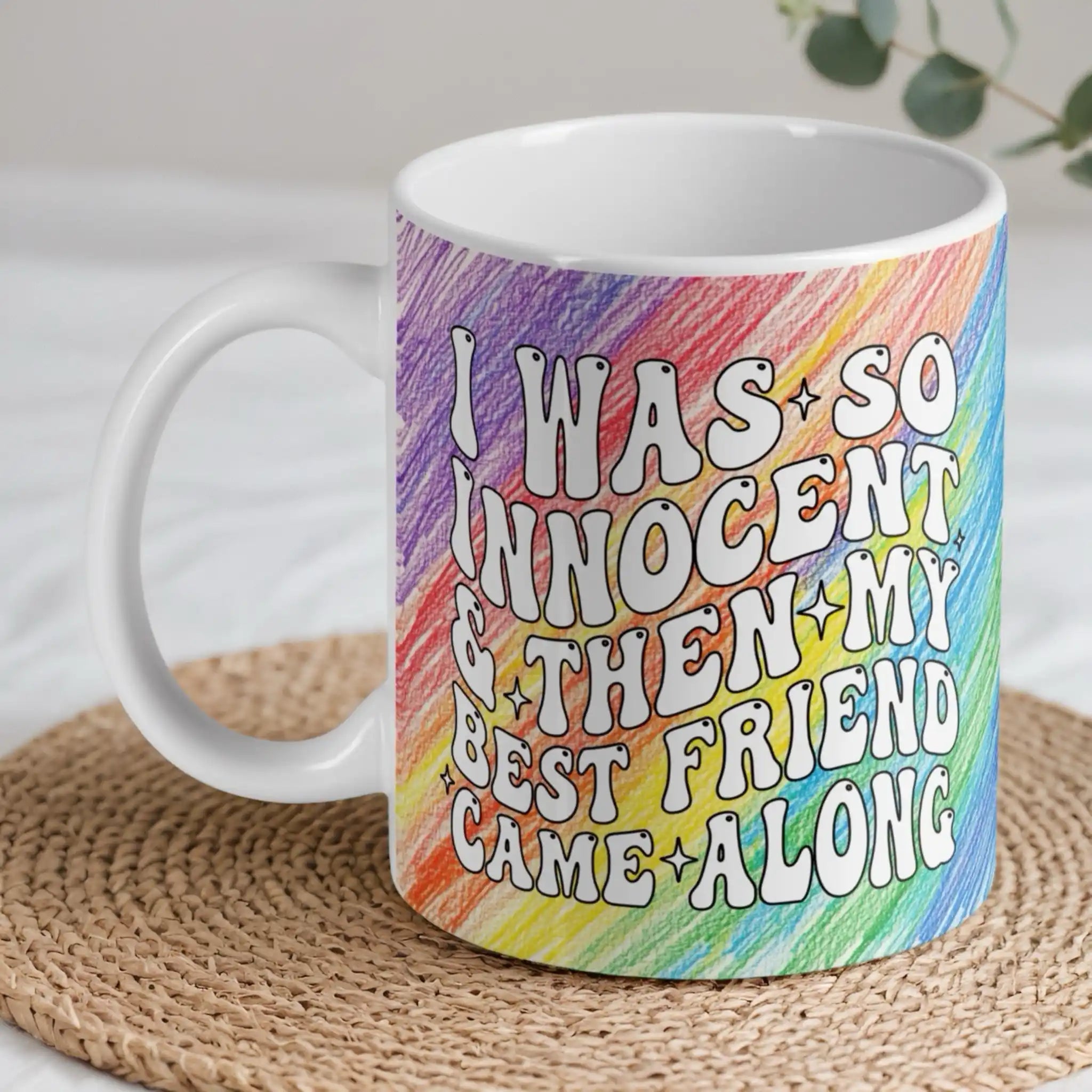 I Was So Innocent ceramic mug by Laser Design Creations, featuring retro groovy rainbow typography and colourful pencil textured quote details.