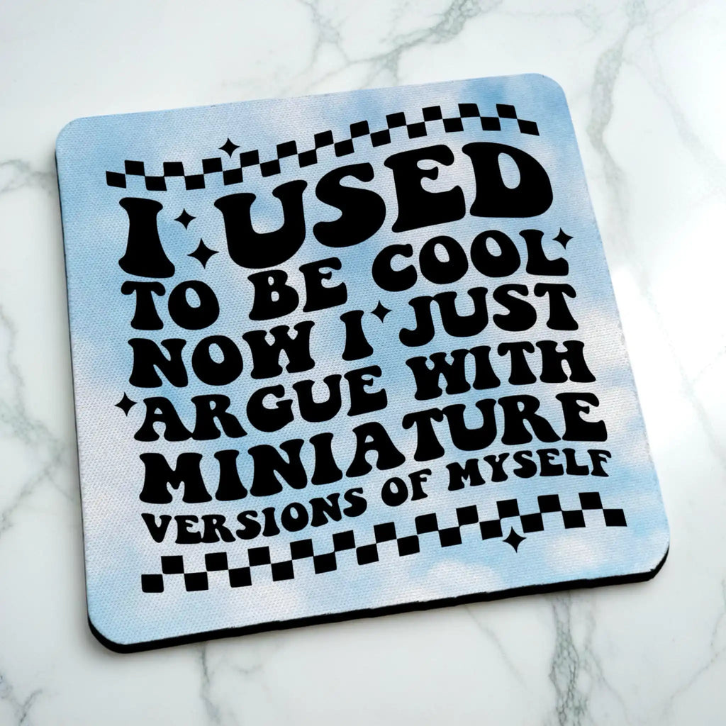 Side view of I Used To Be Cool neoprene coaster with a retro wavy design and blue clouds, by Laser Design Creations.