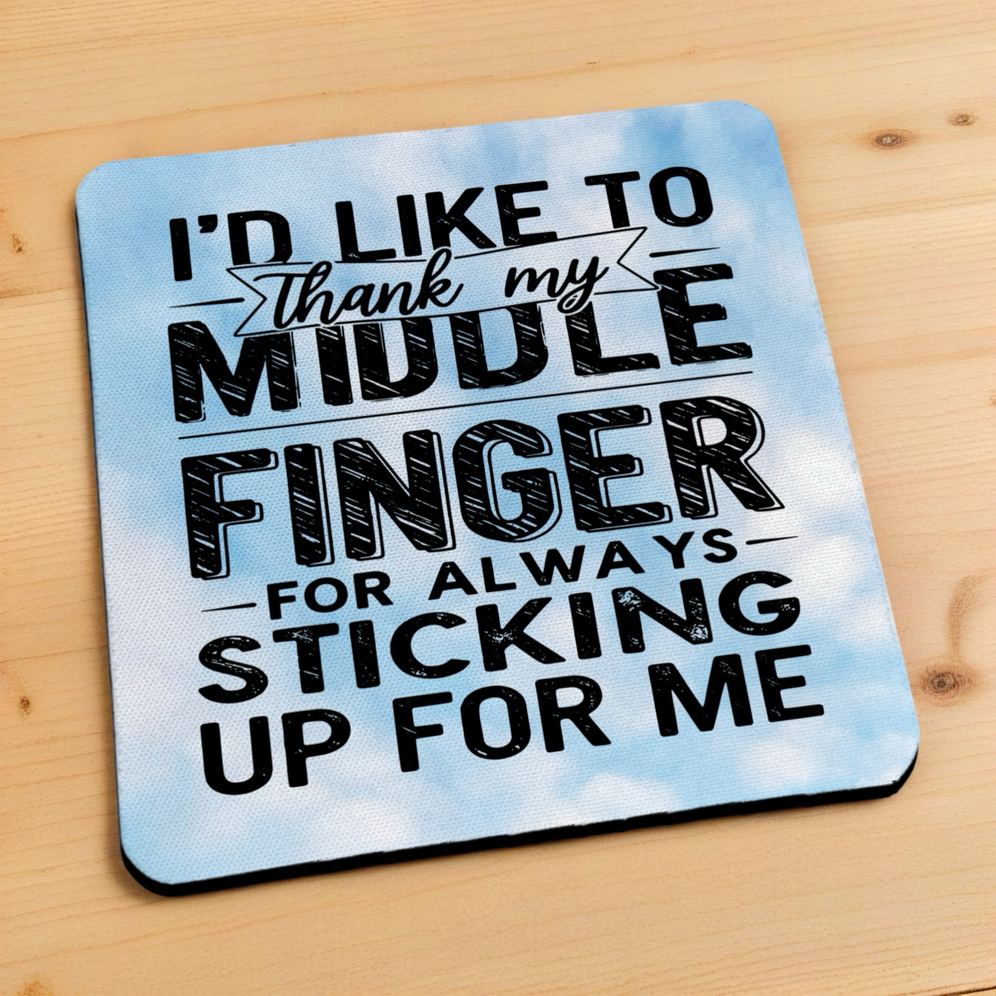 Side view of Thank My Middle Finger neoprene coaster with a detailed edge and blue sky design, by Laser Design Creations.
