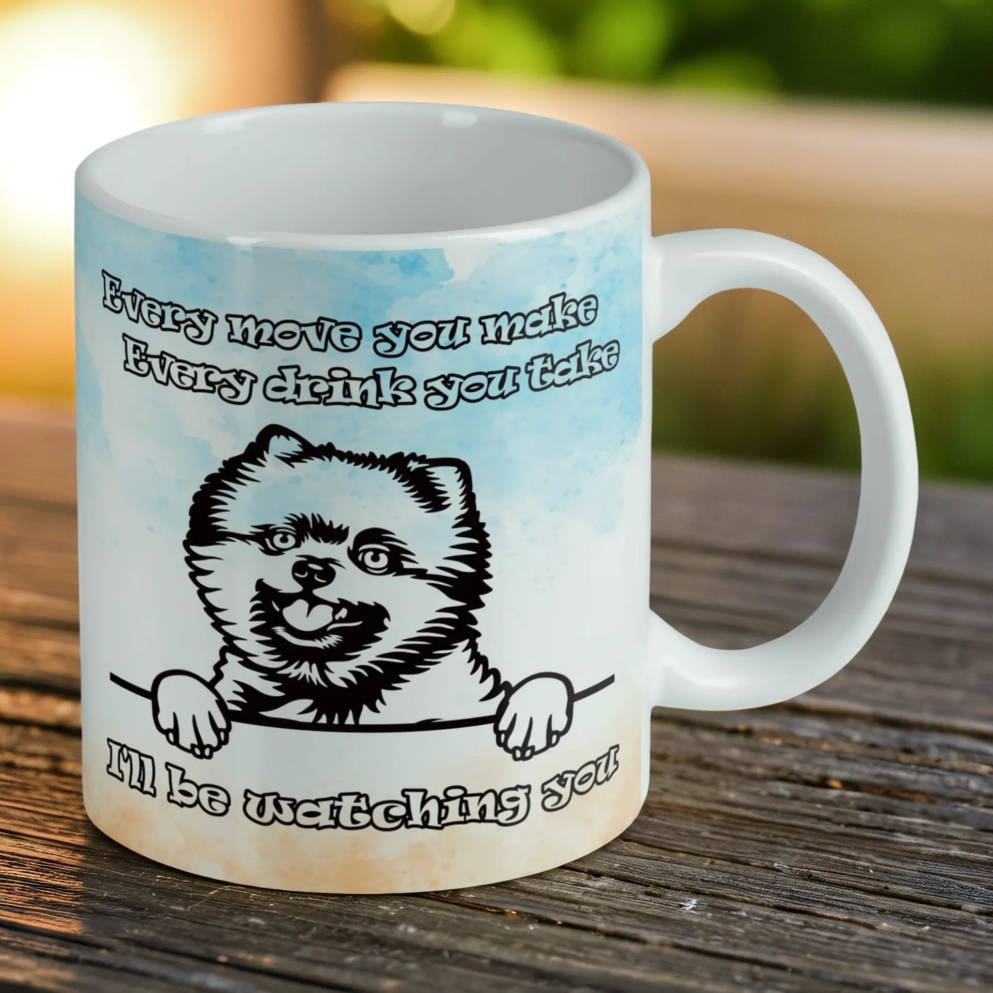 Reverse side of Funny Peeking Pomeranian ceramic mug, showcasing the humorous 'I'll be watching you' Pomeranian design on a clean white background by Laser Design Creations.