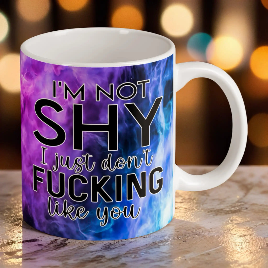 Reverse side of I'm Not Shy I Don't Like You mug, a wrap-around vibrant purple watercolour nebula smoke design with bold typography by Laser Design Creations.
