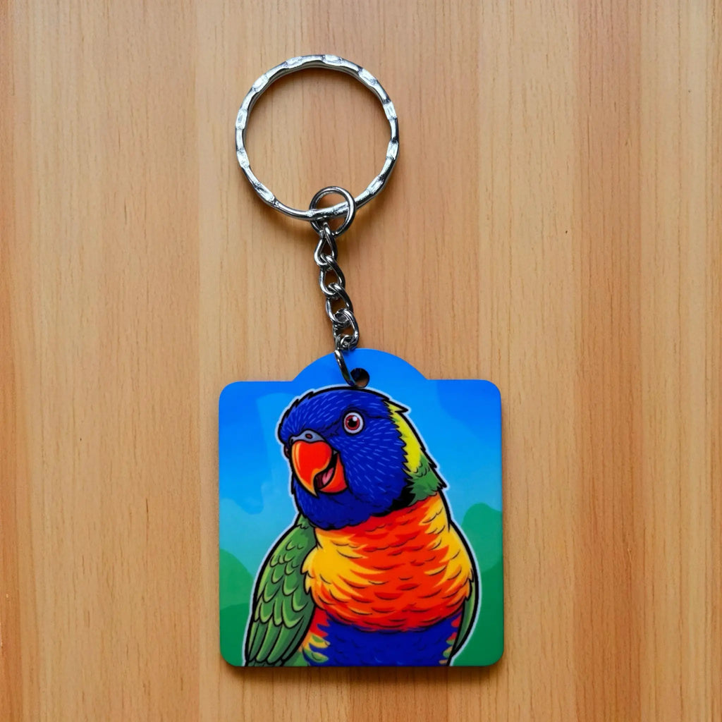 Illustrated Rainbow Lorikeet keyring by Laser Design Creations, featuring a vibrant, cartoon-style depiction of an Australian rainbow lorikeet.