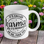 Reverse side of the 'It's Called Karma' ceramic mug, showcasing the wrap-around artwork by Laser Design Creations.