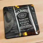 Side view of Jack Daniels Whiskey neoprene coasters, showcasing a vintage, rustic Jack Daniel's Tennessee Whiskey label design set against a dark home bar backdrop by Laser Design Creations.