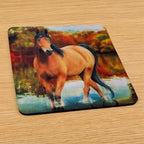 Side view of a set of four Wild Mustang neoprene coasters with a powerful horse in a nature scene, by Laser Design Creations.