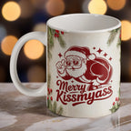 "Merry Kissmyass" ceramic mug by Laser Design Creations, featuring a humorous Santa wearing sunglasses with "Merry Kissmyass" text.