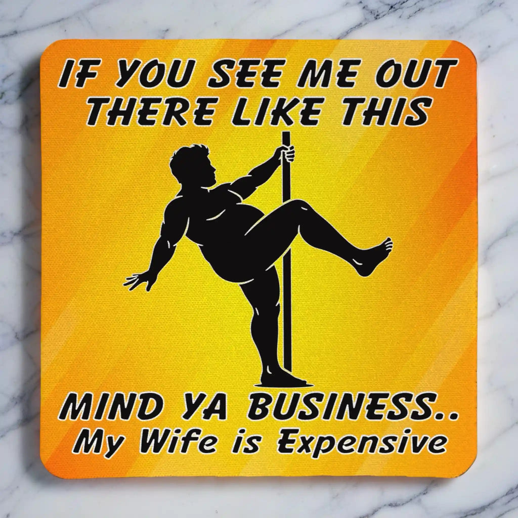 Top view of Mind Ya Business Wife is Expensive neoprene coaster with funny pole dancer silhouette and humorous text, by Laser Design Creations.