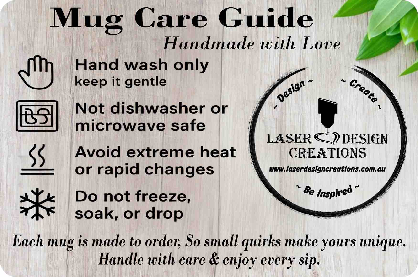 Mug care guide card from Laser Design Creations with hand wash only, not dishwasher or microwave safe, avoid extreme heat, and do not freeze instructions, displayed on a wood background with green leaves and the Laser Design Creations logo.