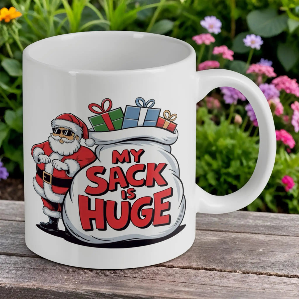 Reverse side of the Funny Santa My Sack Is Huge 11oz ceramic mug, showcasing the hilarious crude humour design of Santa and his huge sack by Laser Design Creations.
