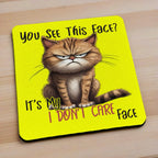 Side view of My I Don't Care Face Grumpy Yellow Cat neoprene coasters, showcasing a humorous cartoon grumpy yellow cat face with the quote, You See This Face? It's My I DON'T CARE Face on a vibrant background, by Laser Design Creations.