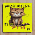 My I Don't Care Face Grumpy Yellow Cat neoprene coasters by Laser Design Creations, featuring a funny yellow grumpy cat cartoon and the sassy quote, You See This Face? It's My I DON'T CARE Face.