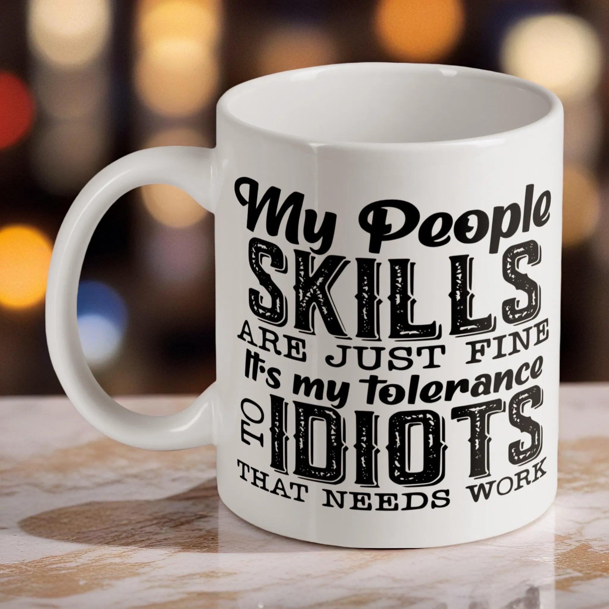 Snarky Typography ceramic mug by Laser Design Creations, featuring the quote "My people skills are just fine it's my tolerance to IDIOTS that needs work" in black font.