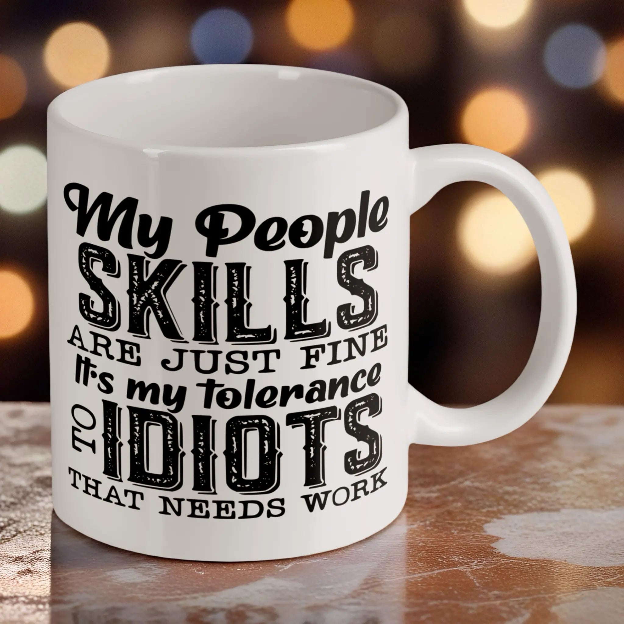 Reverse side of Sarcastic Quote ceramic mug, showcasing humorous black typography text about tolerance to idiots by Laser Design Creations.