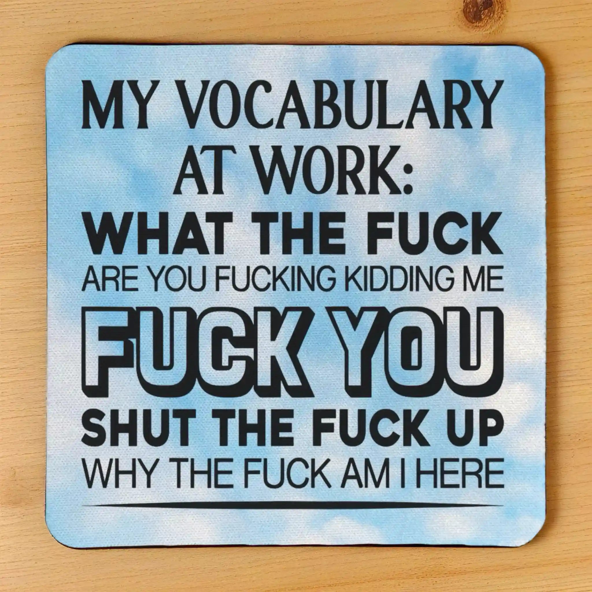 Top view of My Vocabulary At Work Sweary neoprene coaster with bold sarcastic text set against a cloudy blue sky, by Laser Design Creations.