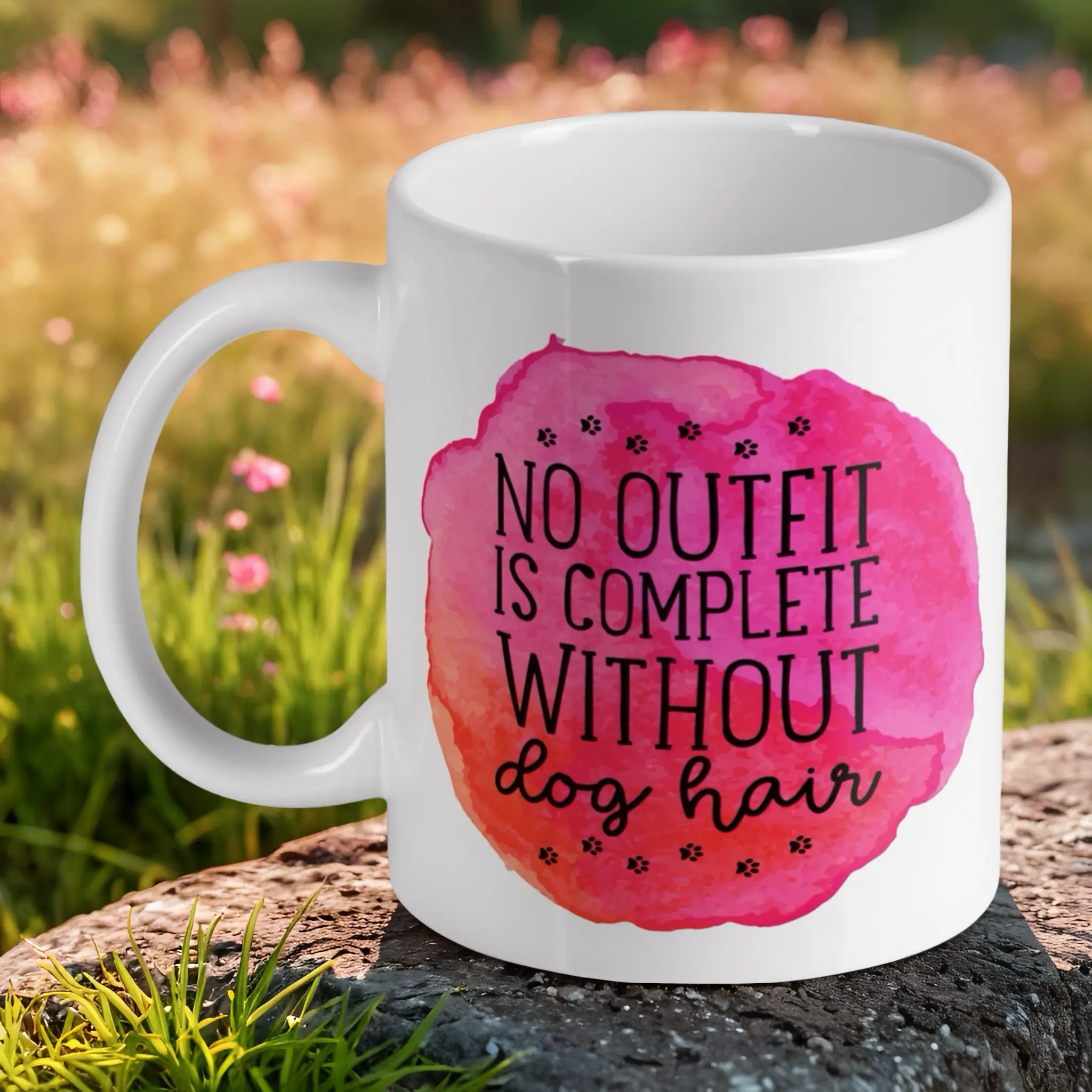 'No Outfit Is Complete Without Dog Hair' quote ceramic mug by Laser Design Creations, featuring charming watercolour text and paw prints.