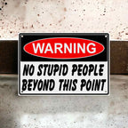 Funny Workshop Decor Aluminium Sign by Laser Design Creations, featuring the sarcastic quote 'WARNING NO STUPID PEOPLE BEYOND THIS POINT' in a classic safety sign style.