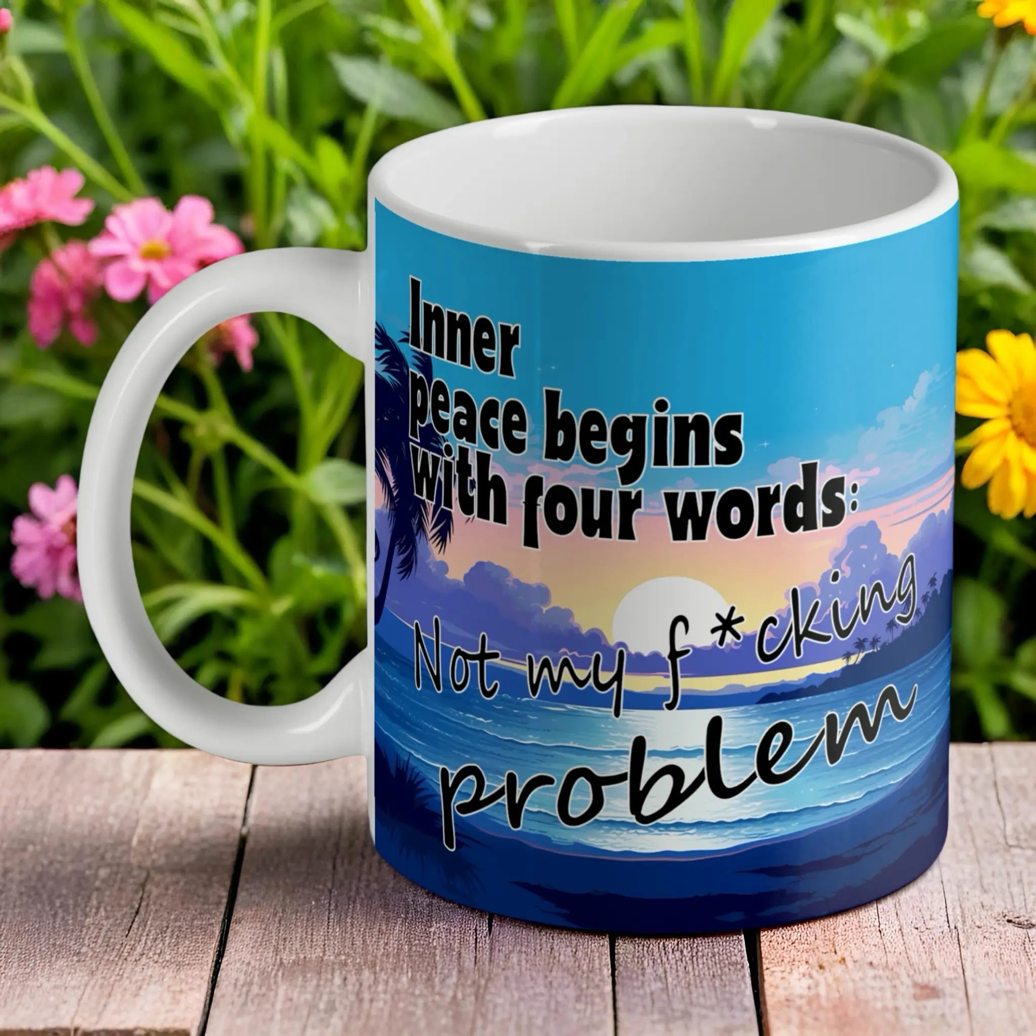 "Inner peace begins... Not my f*cking problem" ceramic mug by Laser Design Creations, featuring a sarcastic quote over a serene beach sunset.