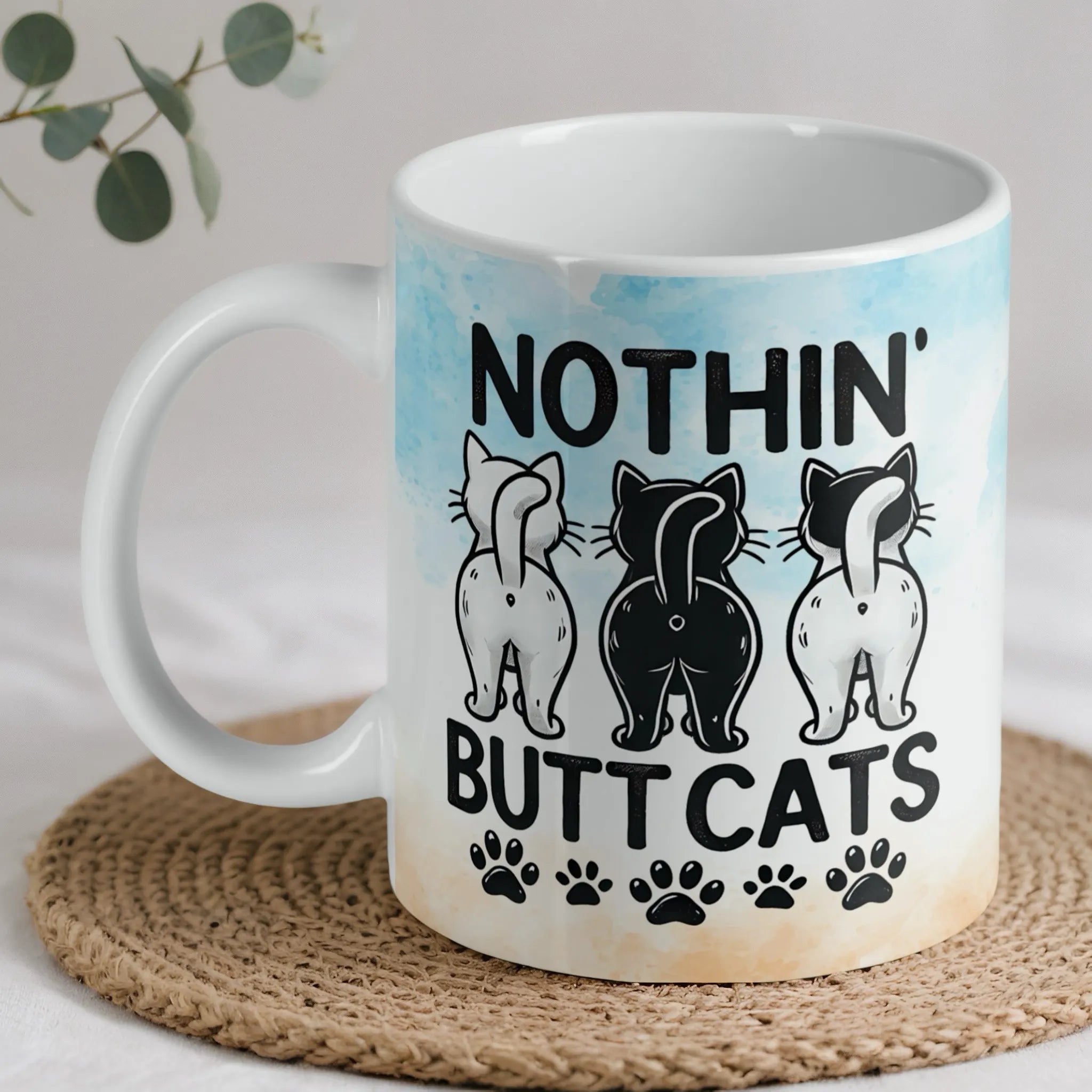 Funny Cat Butts Watercolor Pawprints ceramic mug by Laser Design Creations, featuring humorous cat butts and watercolor pawprints on a white background.