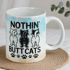Reverse side of Nothin' Butt Cats mug, showing the playful quote and multiple cheeky feline rear ends by Laser Design Creations.