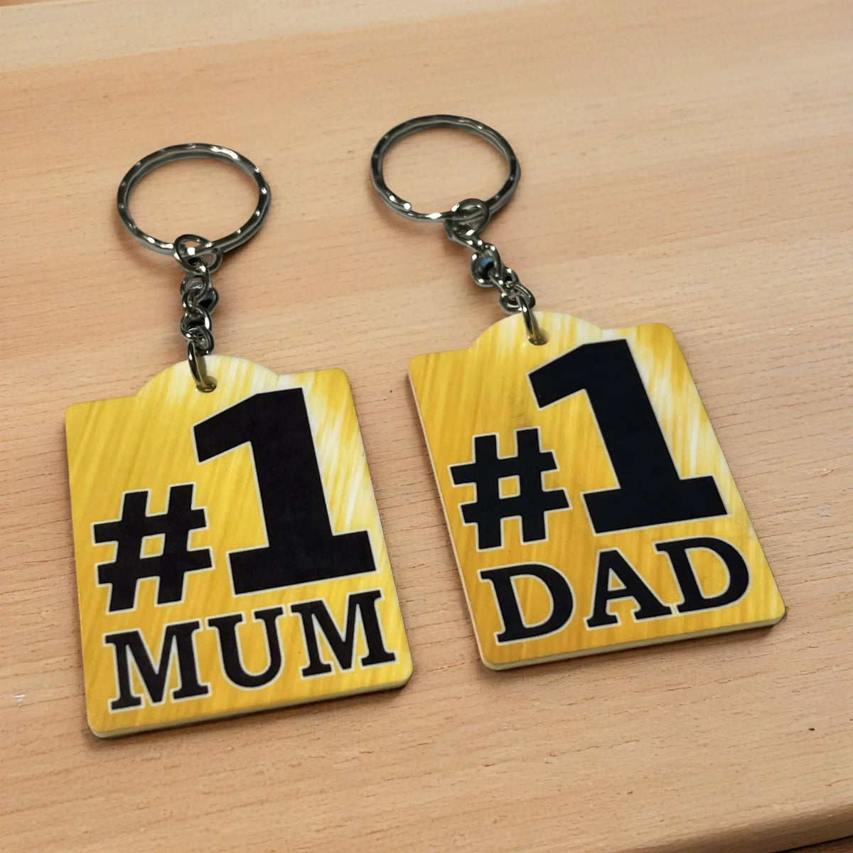 Lifestyle image of the Number 1 Mum or Dad acrylic keyring, printed by Australian small business Laser Design Creations.