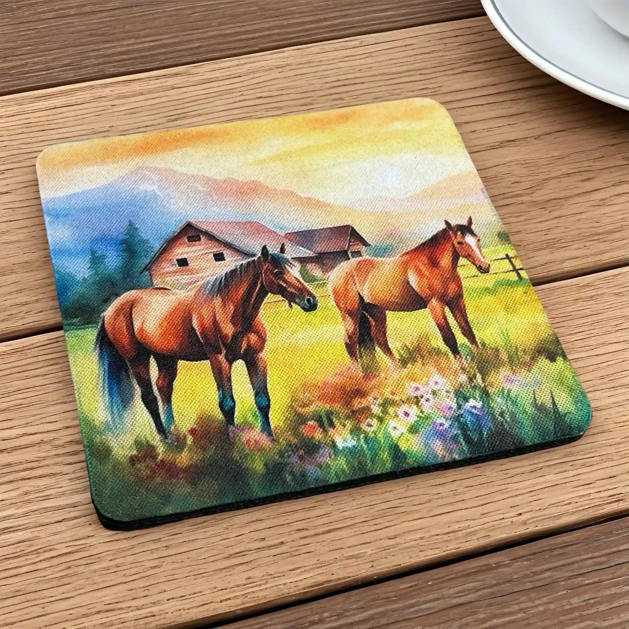 Side view of a set of four Peaceful Horses neoprene coasters with a country farm scene, by Laser Design Creations.