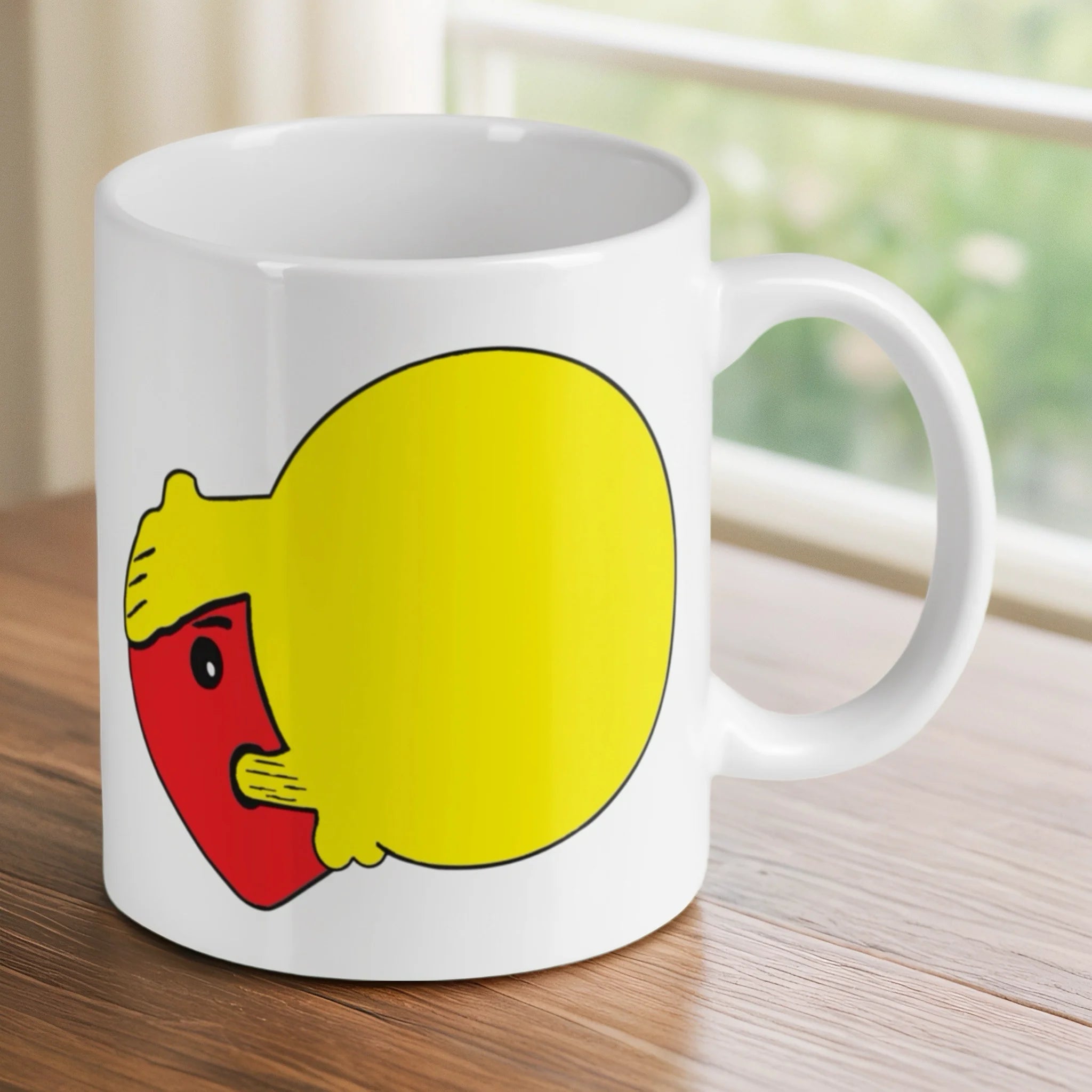 Reverse side of the 'Reality is an Illusion' ceramic mug, showing the emoji character, by Laser Design Creations.