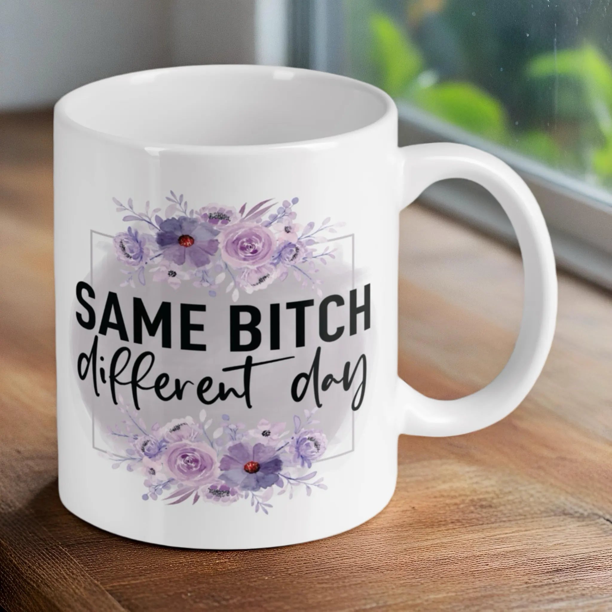 Reverse side of the Floral 'Same Bitch Different Day' ceramic mug, showcasing the wrap-around artwork by Laser Design Creations.