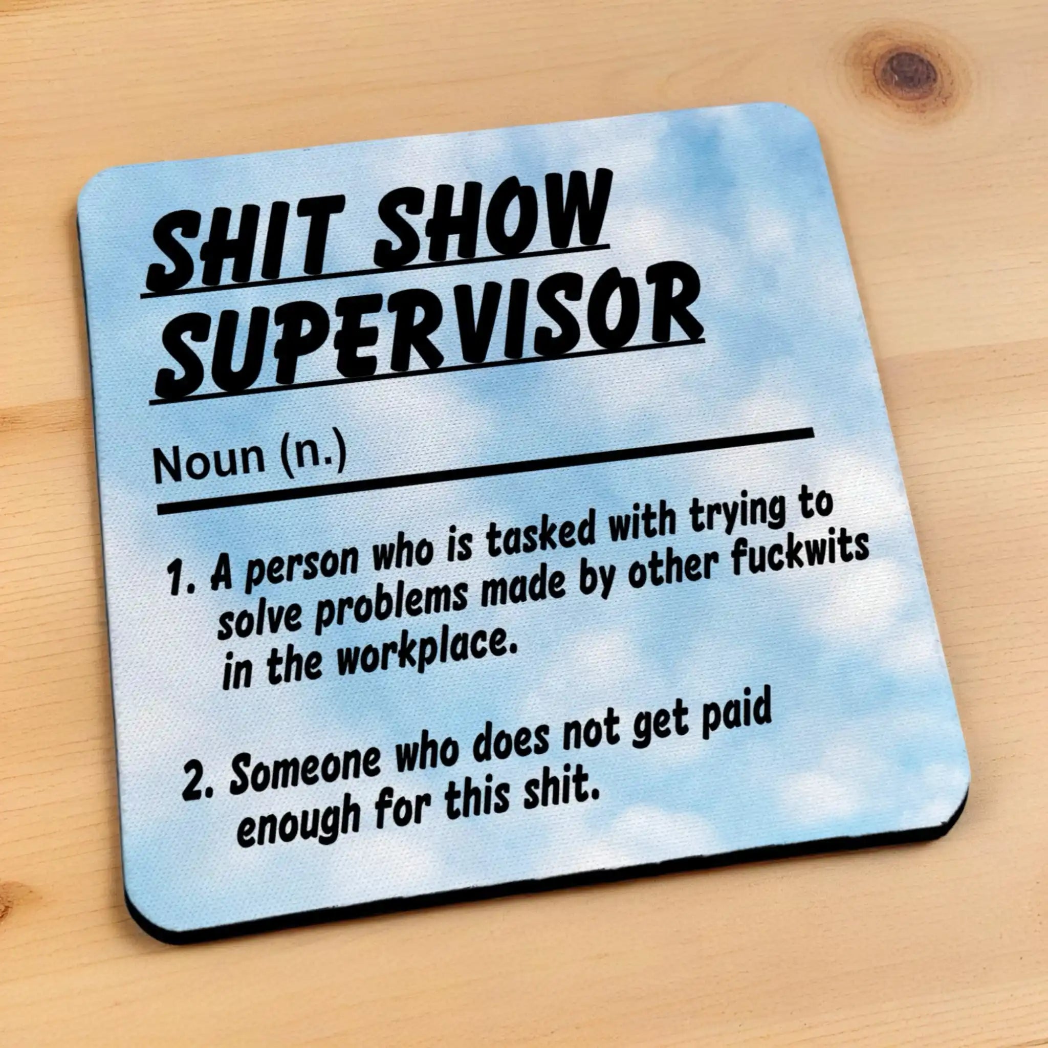 Side view of a Shit Show Supervisor neoprene coaster displaying the humorous definition, by Laser Design Creations.