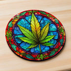 Side view of Colourful Stained Glass Cannabis Leaf neoprene coasters, showcasing a vibrant bohemian weed leaf design with multicoloured panels reflecting light by Laser Design Creations.