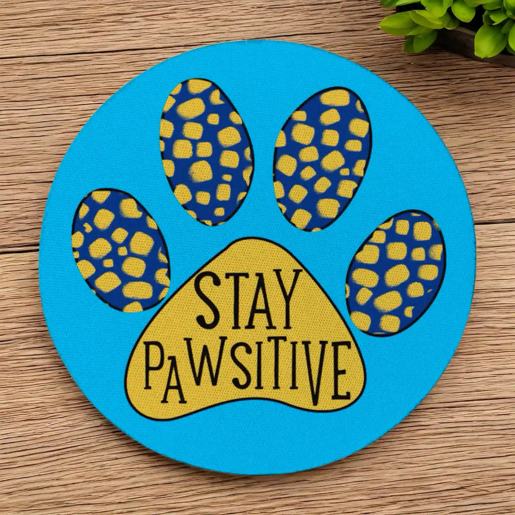 Stay Pawsitive Blue Paw Print neoprene coasters by Laser Design Creations, featuring a bright, whimsical design with the positive quote Stay Pawsitive and cute paw prints.
