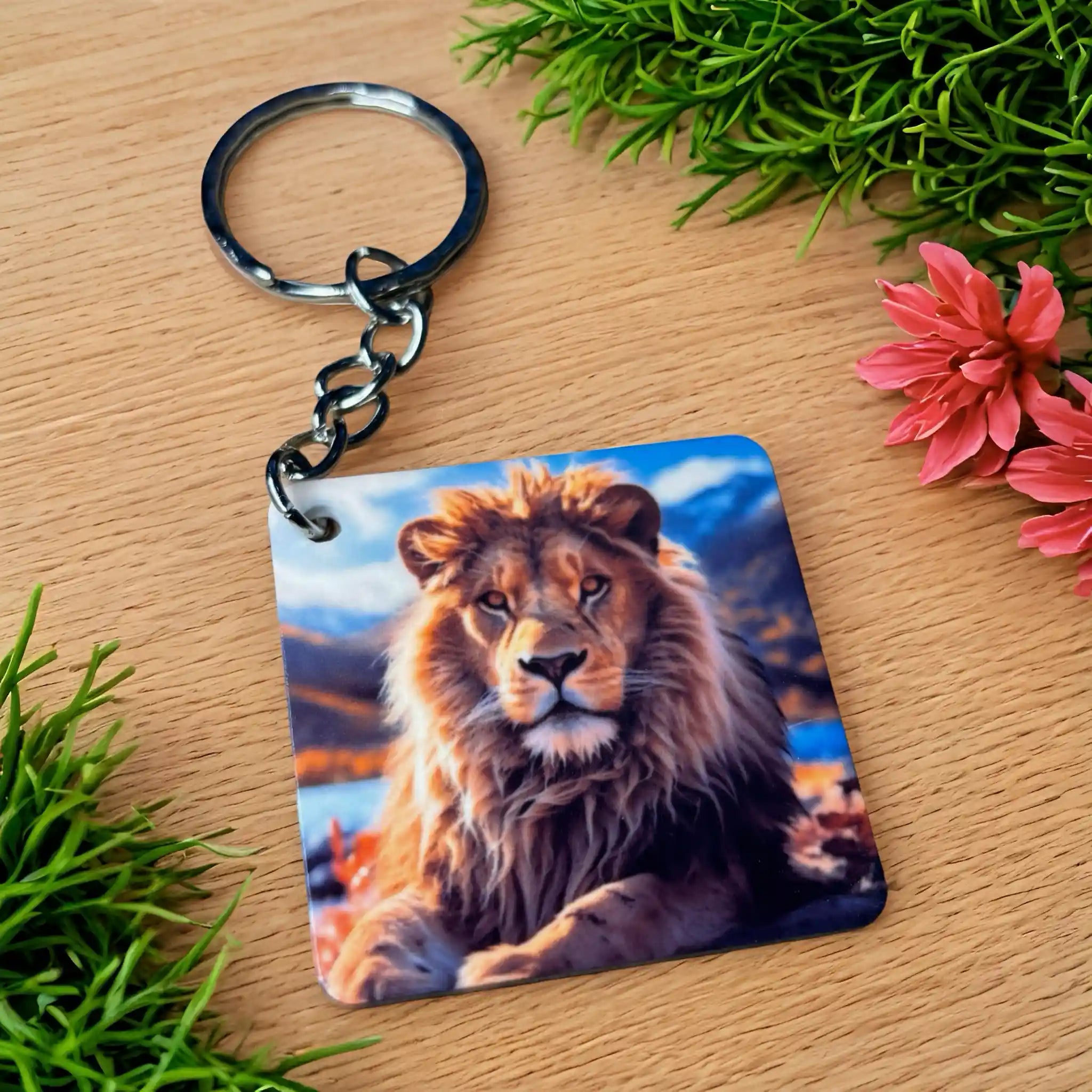 Side view of Stunning Lion Portrait keyring, showcasing a majestic lion's head against a vibrant sunset background by Laser Design Creations.