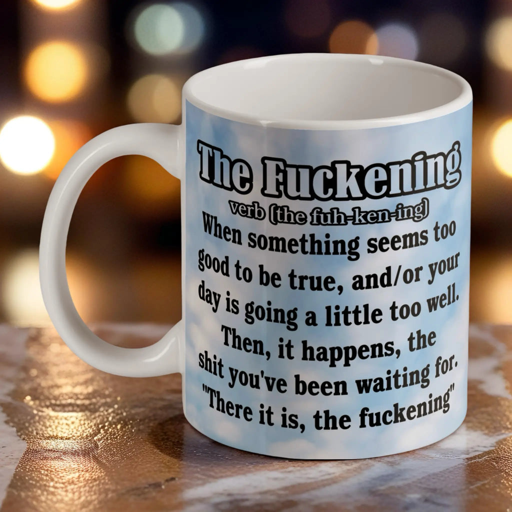 The F*ckening Definition Blue Sky ceramic mug by Laser Design Creations, featuring a funny, sarcastic dictionary definition on a bright blue sky background.