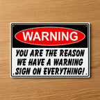 Brilliant Humour Gift Aluminium Sign by Laser Design Creations, featuring a bold design with the witty text: "WARNING YOU ARE THE REASON WE HAVE A WARNING SIGN ON EVERYTHING!", perfect for office jokesters.